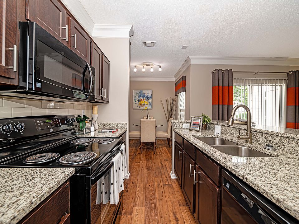 Kitchen with granite counters and modern cabinetry