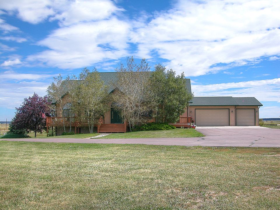 There is a paved driveway.