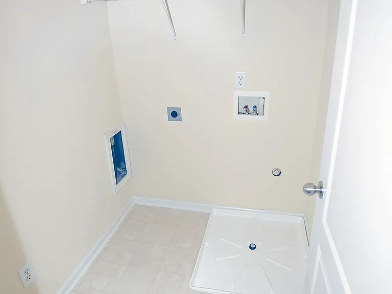 Laundry room with washer and electric dryer hookup