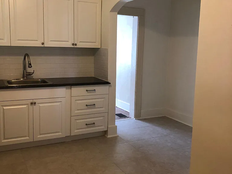 Brand new kitchen. New cabinets, granite countertops, new tile floor and new refrigerator. Fresh paint.