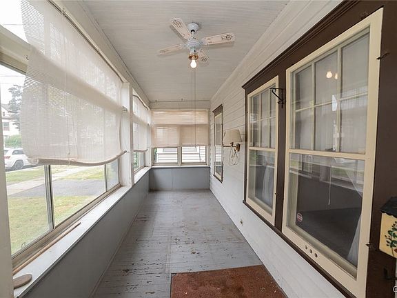 This covered porch is great for storage and recrea