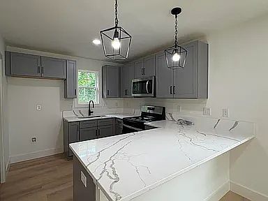 Appliances are not seen in the photos, but will be provided.