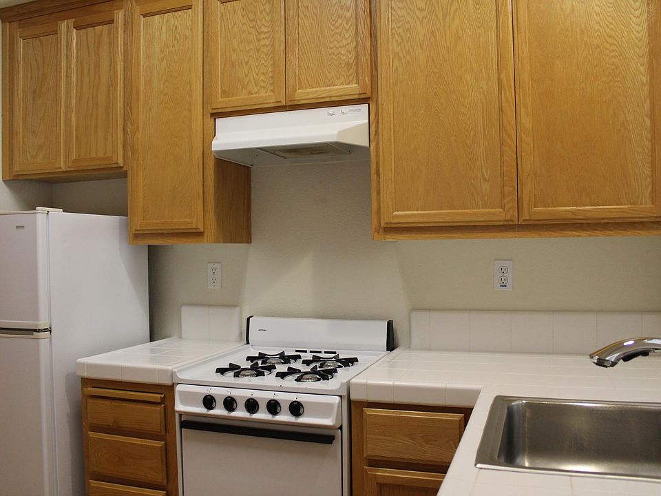 Dishwasher next to sink.