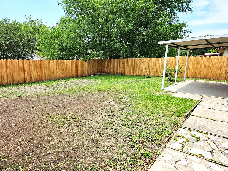 Backyard with covered patio