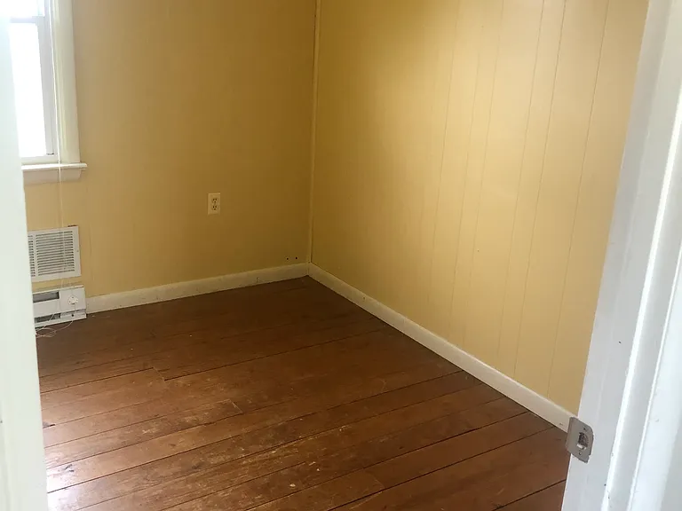 Small bedroom/storage/dressing/hobby room.