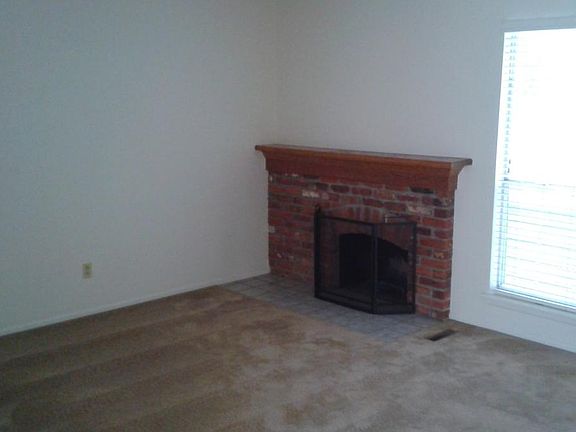 Brick fireplace in living room