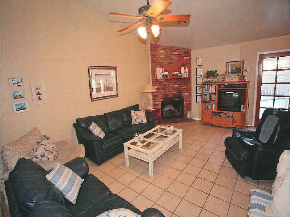 family room with brick firep