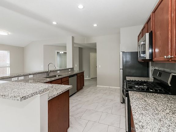 5th image of 6027 Water Violet Ln