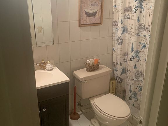 2nd image of 6055 W 19th Ave APT 204