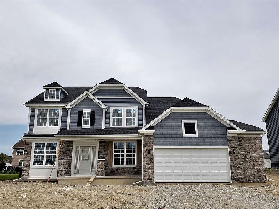 Beautiful home will include front yard sod landscaping.