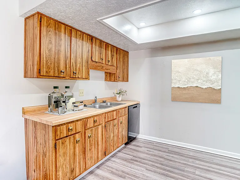 Elevate your living at Tipton Terrace, where modern design meets functionality in this stylish kitchen. Enjoy ample storage, contemporary finishes, and an inviting atmosphere. Ready to make it your own? Schedule a tour today!