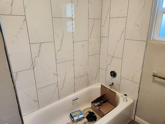 New bathroom. Shower over the tub.