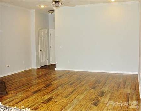 Bright open living room looking towards entry.