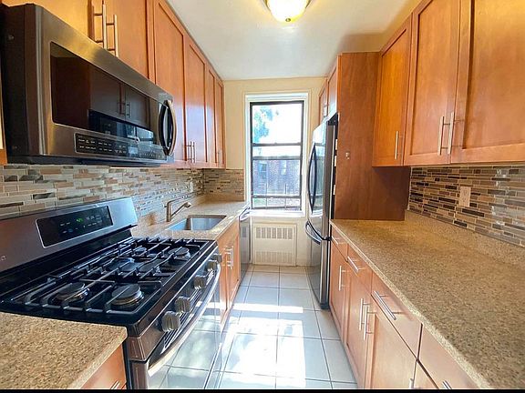 5th image of 67-40 Booth St APT 5