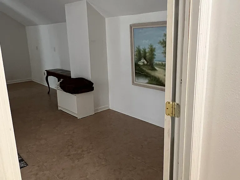 Entryway to the bedroom, the back area is where the TV stand is