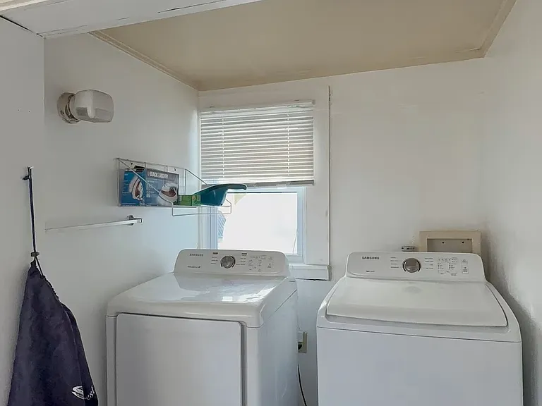 Laundry Area:
Enjoy the convenience of an in-home laundry space, designed for easy access and functionality.