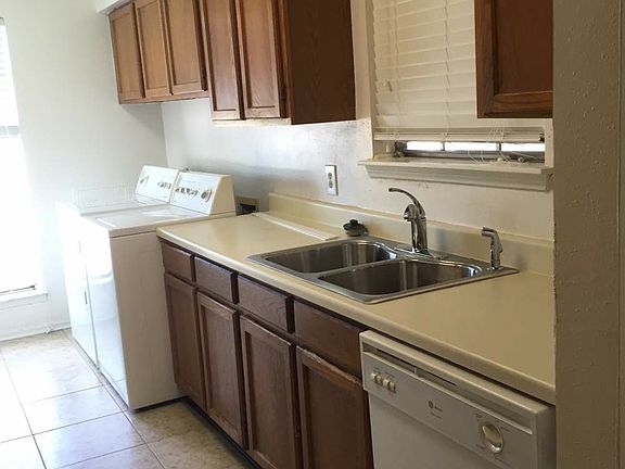 Kitchen w/ Washer and Dryer