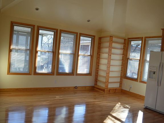 Vaulted ceilings, natural wood floors and trim