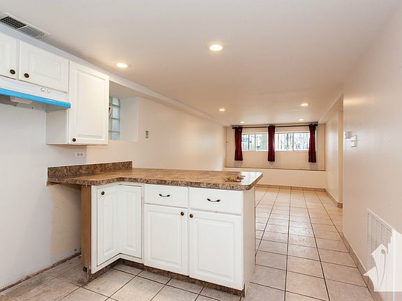 3rd image of 2021 N Albany Ave APT Gdn