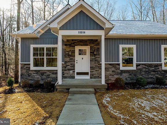 Vinyl siding, stone front