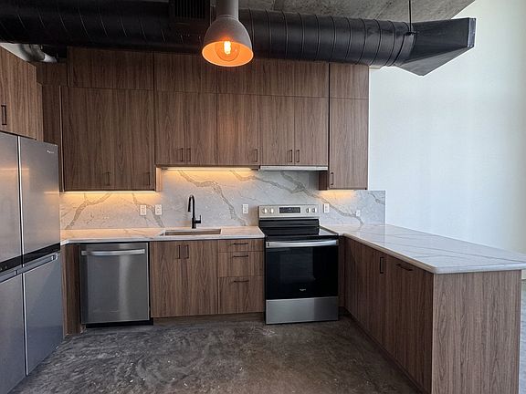 Brand new luxury kitchen, appliances, and cabinetry. NOTE: Countertops and backsplash will be installed 9/18.