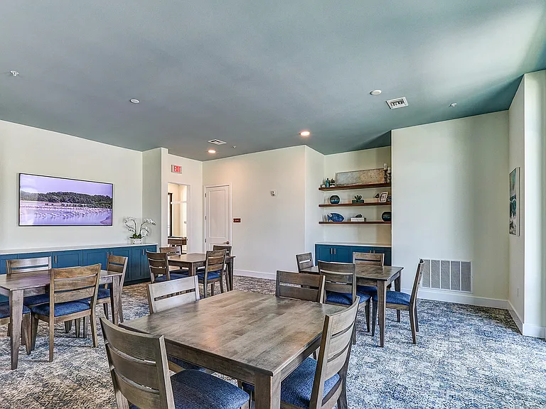 Imperial Crossing Luxury Apartment Homes community clubhouse seating area.