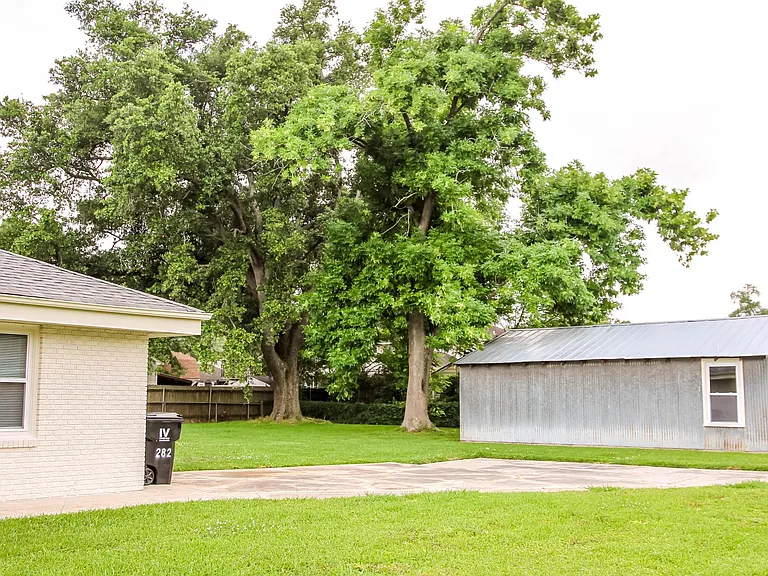 Large yard with garage