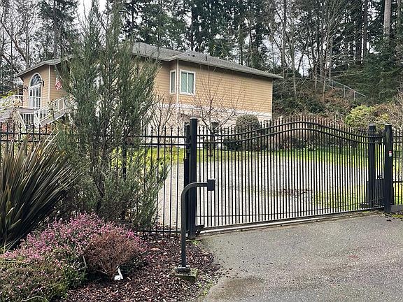 Entrance to the property. The property is completely fenced.