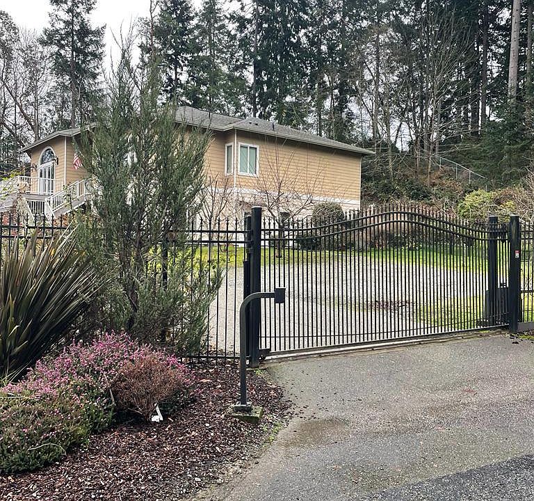 Entrance to the property. The property is completely fenced.