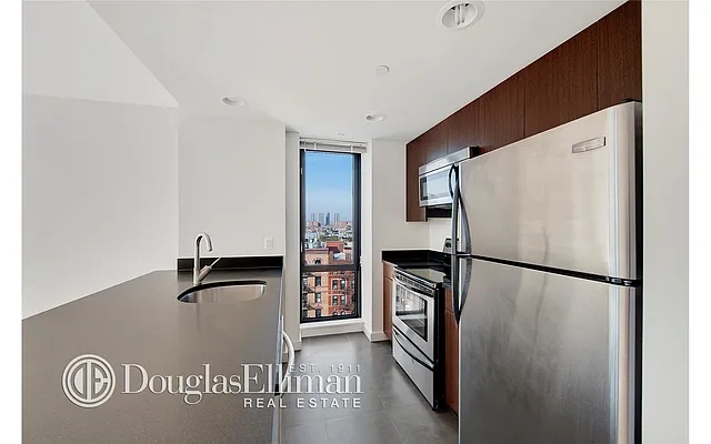 Sold by Douglas Elliman | media 12