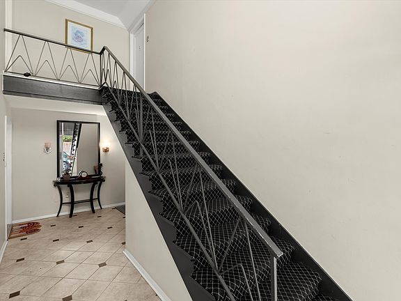 Front entrance, stairs to quiet second-floor unit. No adjoining walls with neighbors.