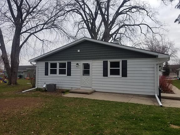 This is the back looking to the yard all new shutters windows and shakes