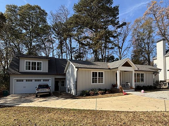 Front-side view with house, garage, office, and upstairs in-law studio