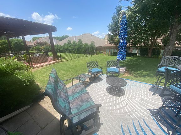 spacious backyard with patio
