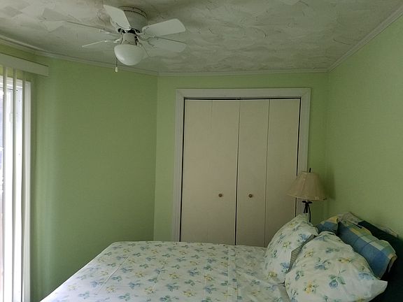 Guest room w/ door to deck