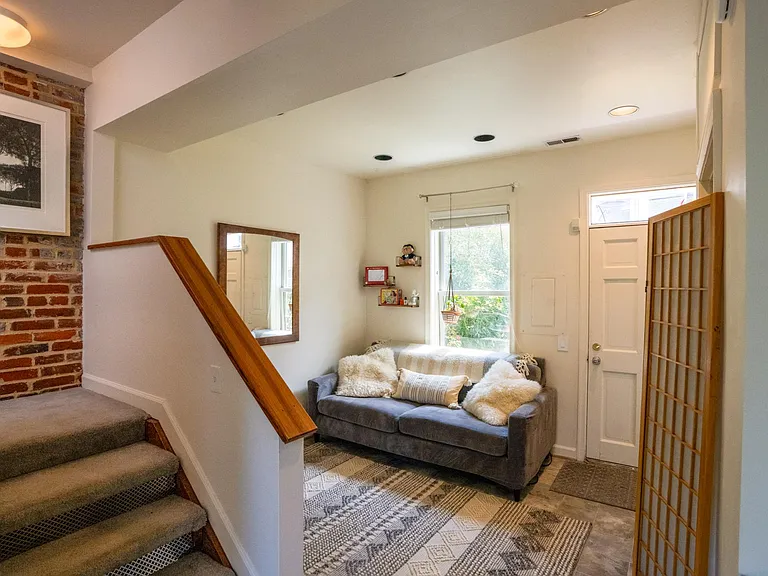 Stairs to the second floor bedroom.