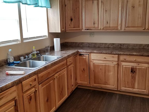 Many cabinets and counters