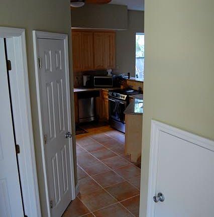 Hallway leading into kitchen