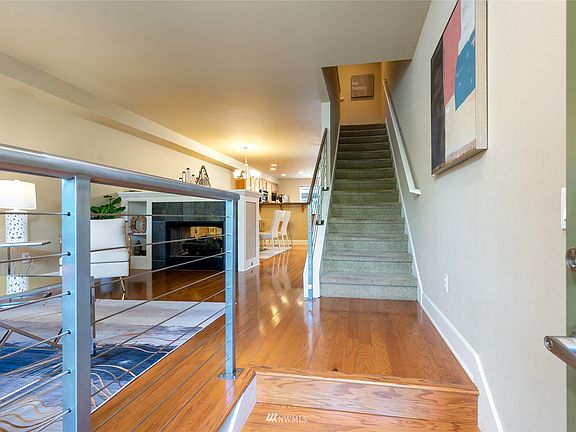 Metal cable railing adds a modern flair to this chic San Francisco-style townhome. 