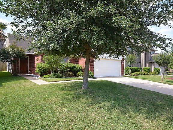 Mature trees and landscaping.