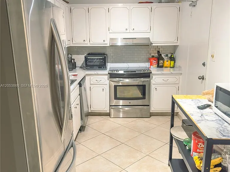 10185 Collins Ave #202 — Photo 21
