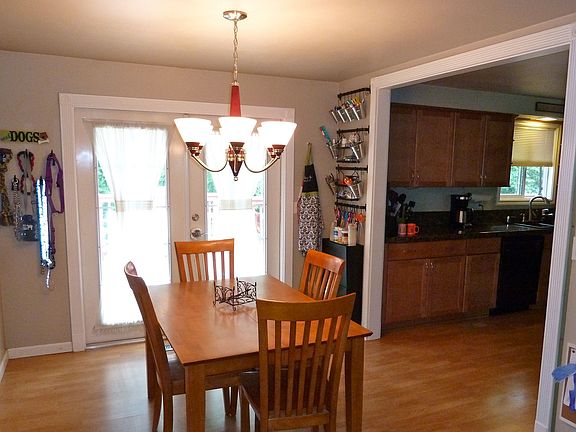 Large dining room w/lovely french doors leading to deck