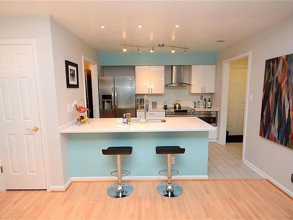 Open to Top-Grade Remodeled kitchen, Ceramic Flrs, Quartz Counters and more.