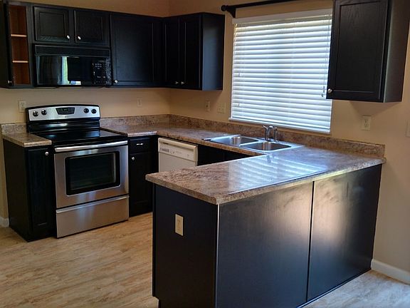 Cabinets have been replaced with new white cabinets