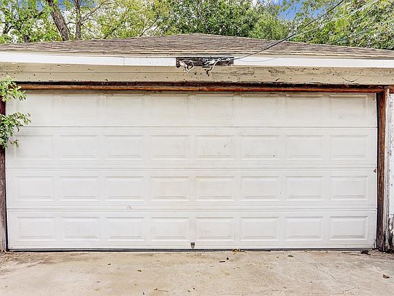 Over size 2 car garage in the back of the property.