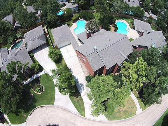  The home in the center of this aerial view is 15 Shooting Star.