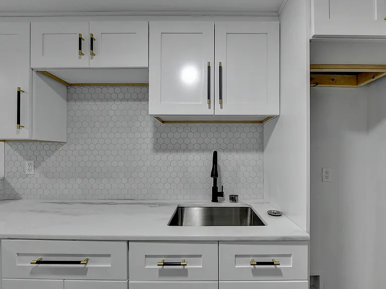 Kitchen with microwave owen and induction cooktop and refrigerator not shown