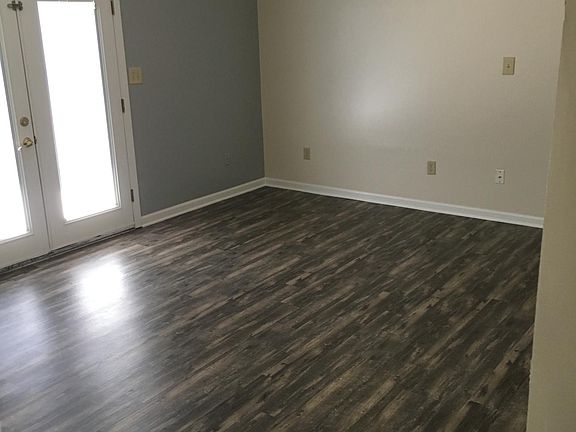 Living room with vaulted ceiling