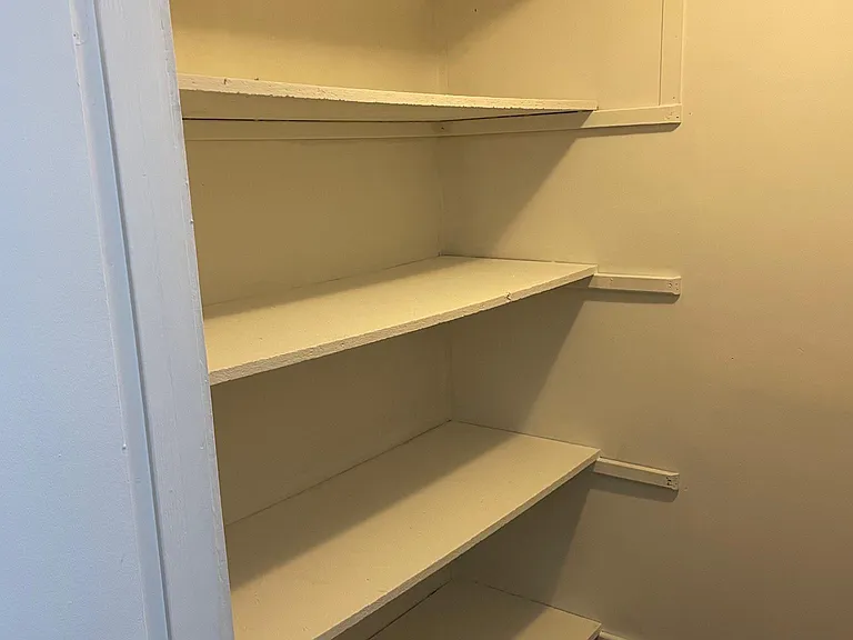 Storage room in Basement with shelfs