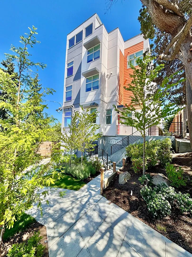 2025 Built Queen Anne Townhome with Rooftop & Water Views — Photo 1